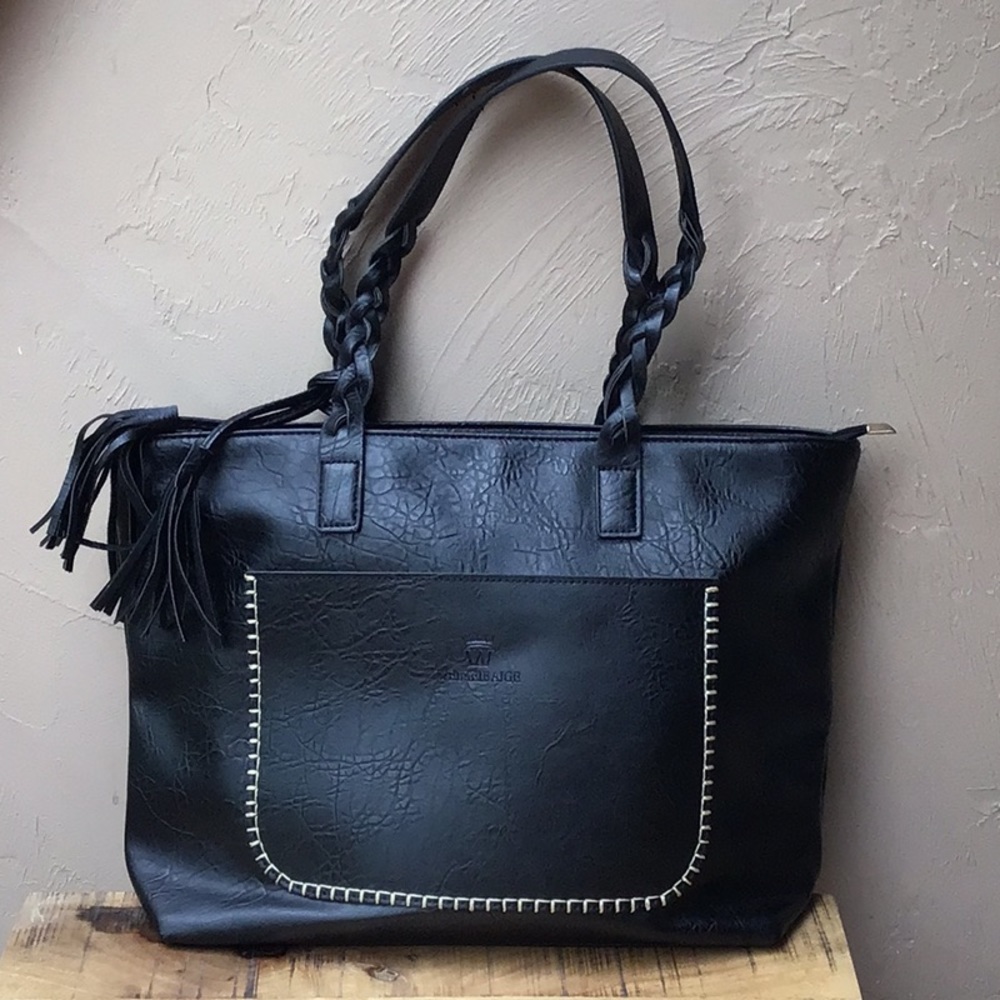 Weimeibaige black tote. Interior in like new condition.